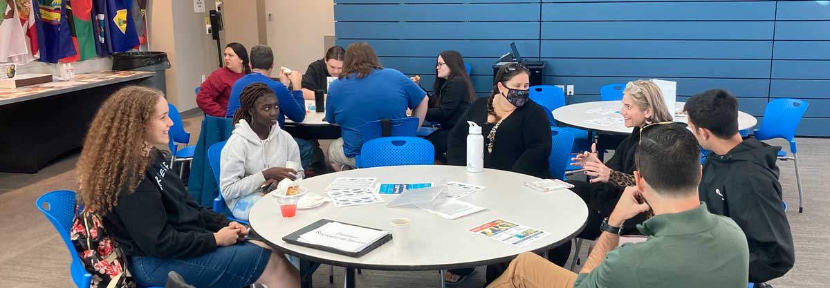 BCC first-generation students sitting in a circle